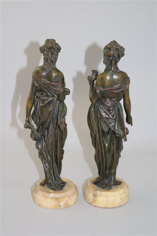 A pair of late 19th century French bronze figures of classical maidens, 11in.